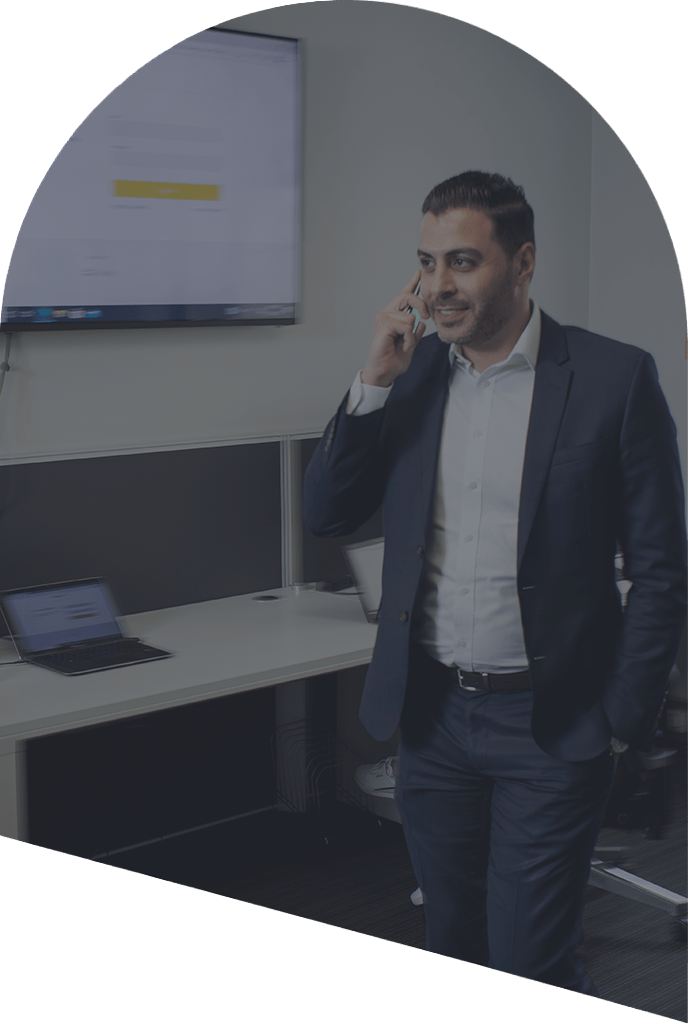 Nexon employee on phone in office