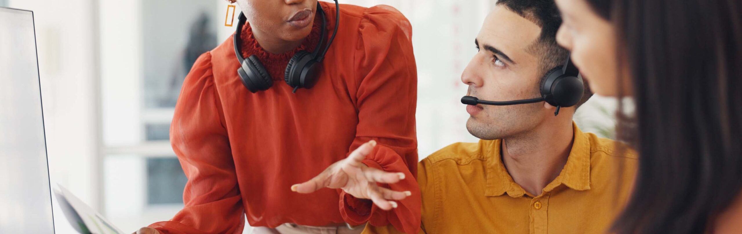 Woman, leadership and telemarketing team training with tablet, consultant documents and customer support consulting. Diversity, teamwork coaching and conversation in call center for crm management