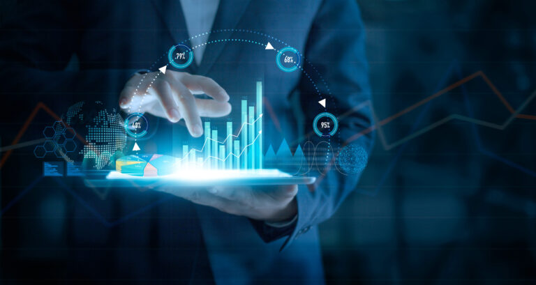 Businessman using tablet analyzing sales data and economic growth graph chart on virtual interface. Business strategy. Abstract icon. Digital marketing