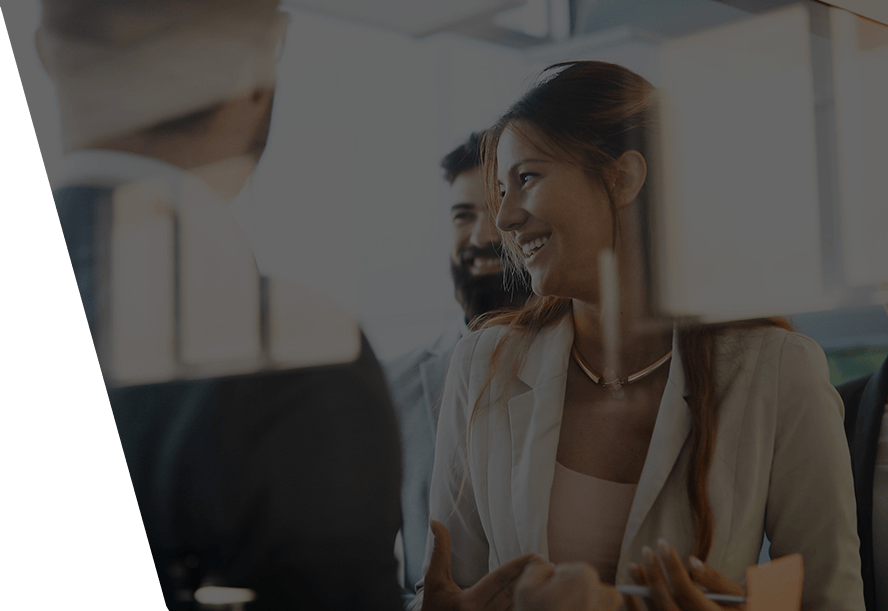 woman smiling with colleagues